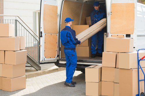 House movers loading furniture for a St Helier home move