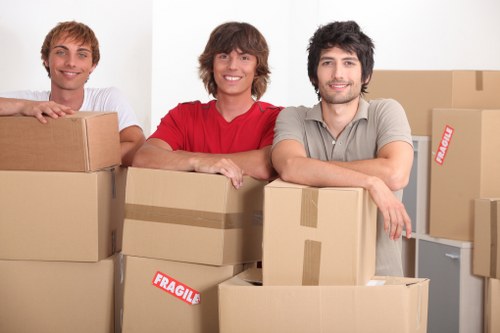 Careful unloading of household items during a St Helier move