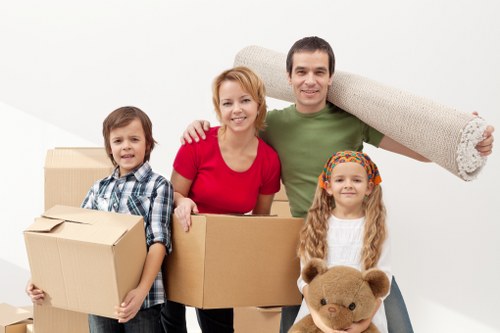Residential moving help in St Helier with boxes and furniture