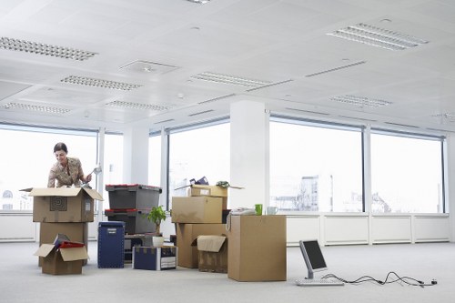 Household relocation with furniture carried carefully through a St Helier property